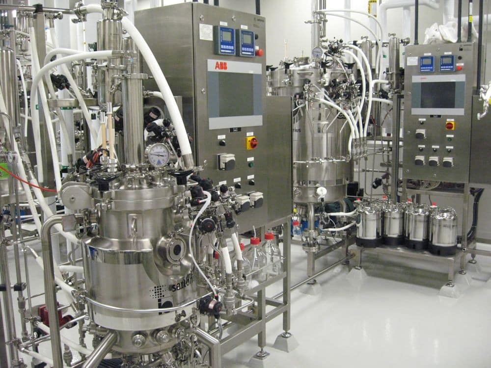Industrial biomanufacturing scale up train stainless steel bioreactors